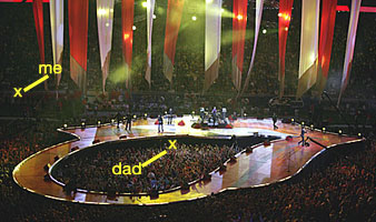 dad and I at super bowl xl in detroit I was on the side lines and dad was in the middle under the tongue of the stage. Image © original source.